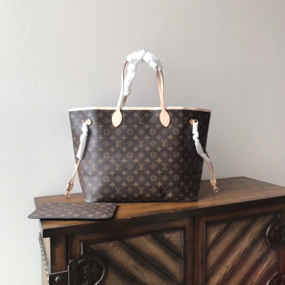 LV複刻版 Louis Vuitton NEVERFULL 大號購物袋 路易威登M40090老花杏裡 路易威登新款 Neverfull 全新演繹經典手袋，探索袋內精緻細節。重新設計的內袋採用了清新的織物內襯和靈感源自路易