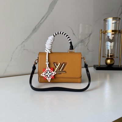 LOUIS VUITTON LV路易威登 M50282 TWIST 中號手袋 2020 年夏季，路易威登以絢麗色彩重繹品牌經典。本款 Twist 中號手袋取材深染 Epi 皮革，搭配手柄和炫彩名牌及掛飾，更有 LV Twi