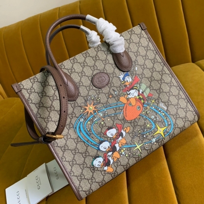 GUCCI古馳 原廠皮 648134唐老鴨TOTE 尺寸：31*26.5*14cm